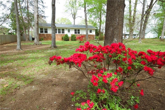 view of yard with fence