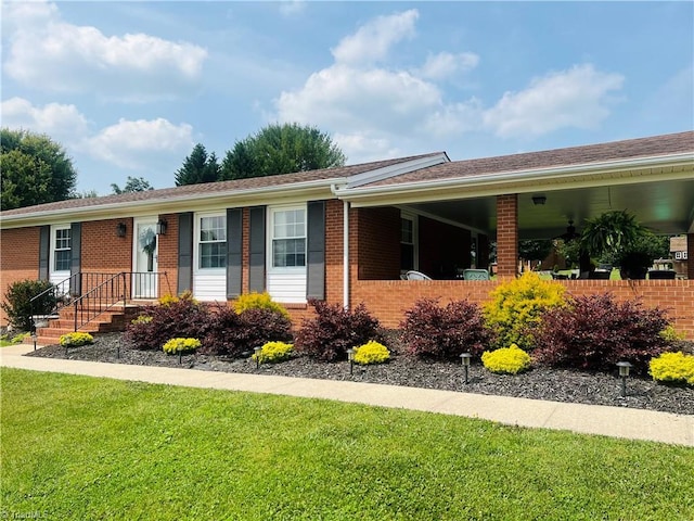 216 E Devon Dr, Mount Airy, NC 27030 - ranch-style home featuring brick siding and a front lawn