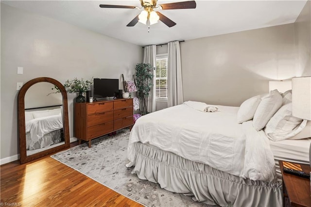 216 E Devon Dr, Mount Airy, NC 27030 - bedroom with light wood-style flooring and a ceiling fan