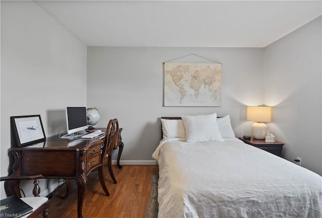 216 E Devon Dr, Mount Airy, NC 27030 - bedroom featuring wood finished floors and a desk