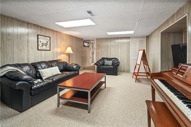 216 E Devon Dr, Mount Airy, NC 27030 - living room with carpet floors, a drop ceiling, and wooden walls