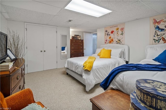 216 E Devon Dr, Mount Airy, NC 27030 - bedroom featuring a paneled ceiling, a closet, and carpet flooring