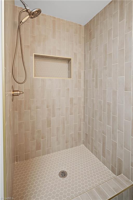 216 E Devon Dr, Mount Airy, NC 27030 - bathroom with a tile shower