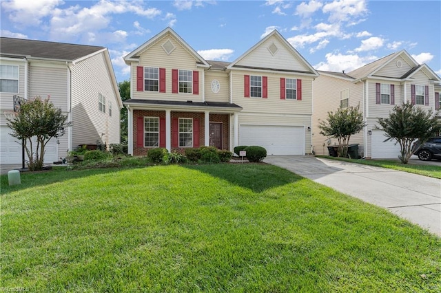 view of front facade with a garage and a front lawn