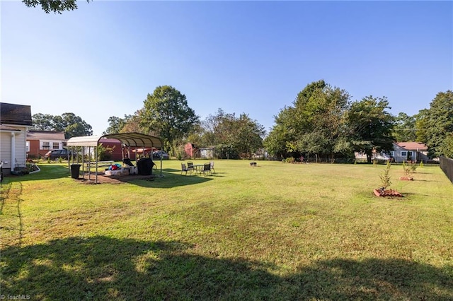 view of yard with a carport