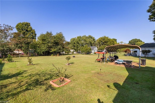 view of yard with a carport