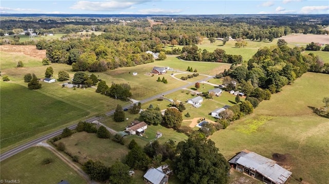 birds eye view of property featuring a rural view