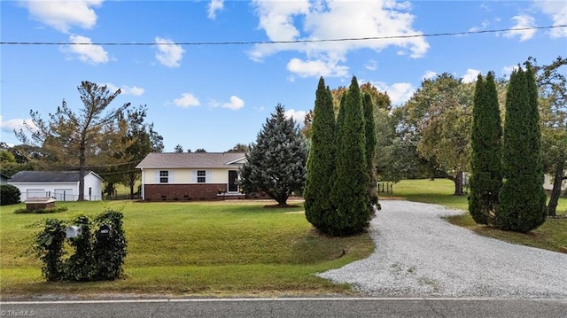 2505 Banner Whitehead Rd, Sophia, NC 27350 - ranch-style home with a front yard, driveway, crawl space, and brick siding