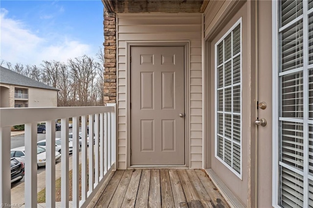 entrance to property with a balcony