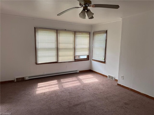 208-210 Long St, Thomasville, NC 27360 - unfurnished room featuring crown molding, carpet, a ceiling fan, a baseboard radiator, and baseboards