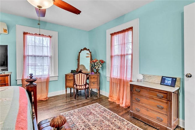 bedroom featuring dark hardwood / wood-style flooring