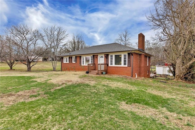 single story home featuring a front yard