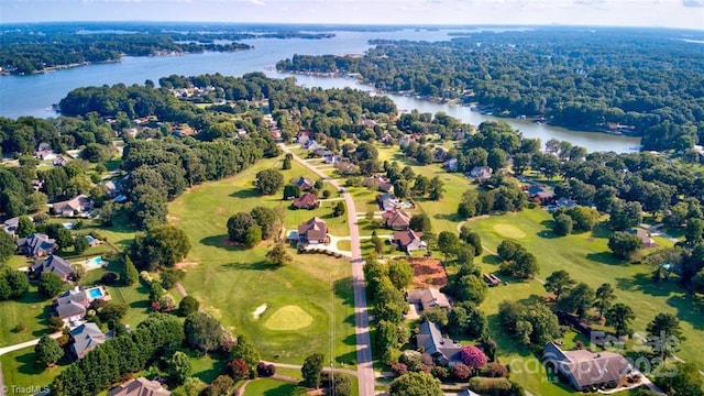 bird's eye view featuring a water view and a view of trees
