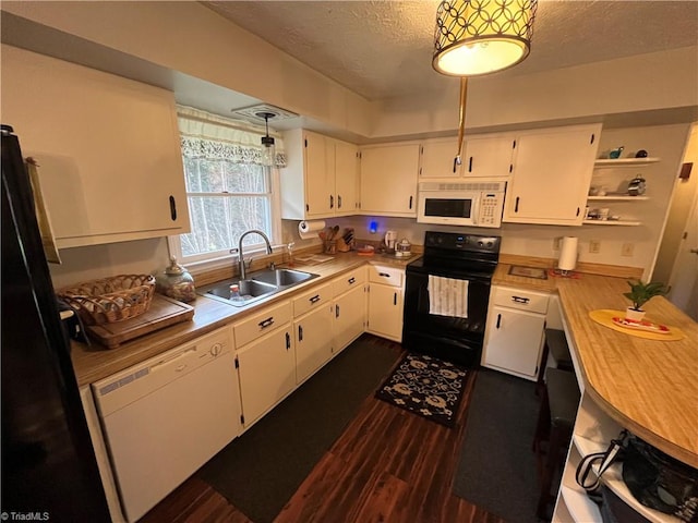 kitchen with black appliances, a textured ceiling, sink, dark hardwood / wood-style floors, and white cabinetry