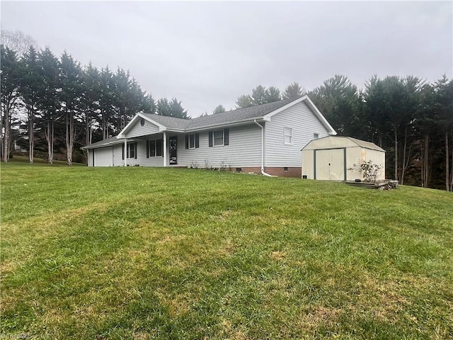 exterior space with a shed and a yard