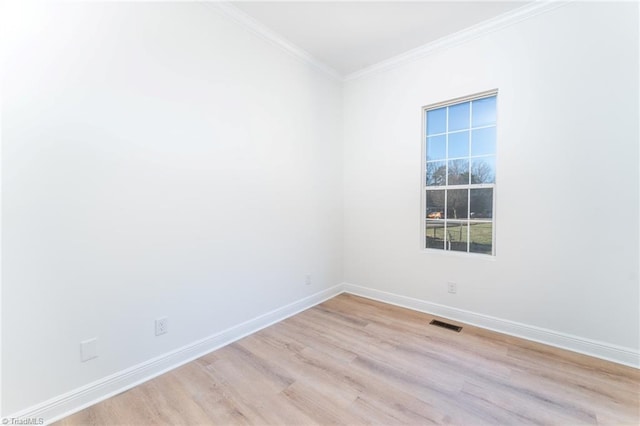 4114 Rose Lake Dr, Greensboro, NC 27407 - spare room with light hardwood / wood-style flooring and ornamental molding