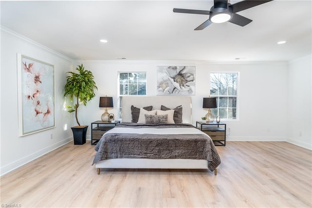 4114 Rose Lake Dr, Greensboro, NC 27407 - bedroom with light hardwood / wood-style flooring, ceiling fan, and crown molding