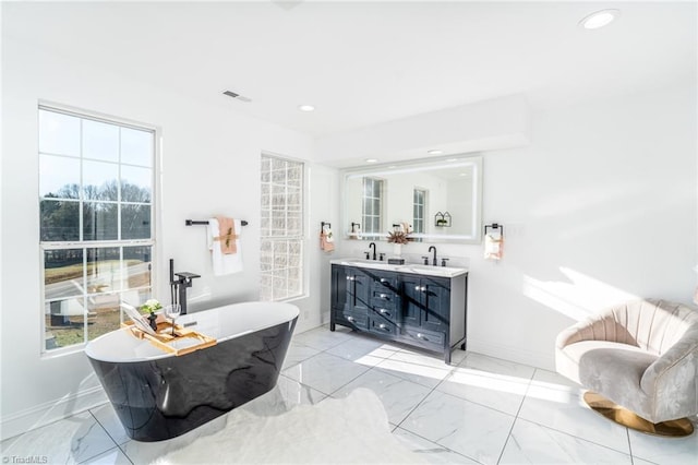 4114 Rose Lake Dr, Greensboro, NC 27407 - bathroom with vanity and a bath