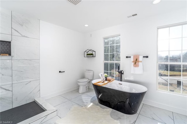 4114 Rose Lake Dr, Greensboro, NC 27407 - bathroom featuring a bath and toilet