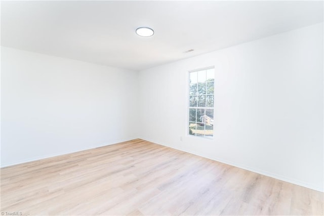 4114 Rose Lake Dr, Greensboro, NC 27407 - spare room with light hardwood / wood-style flooring