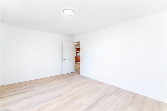 4114 Rose Lake Dr, Greensboro, NC 27407 - unfurnished room with light hardwood / wood-style flooring