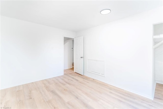4114 Rose Lake Dr, Greensboro, NC 27407 - empty room with light hardwood / wood-style flooring