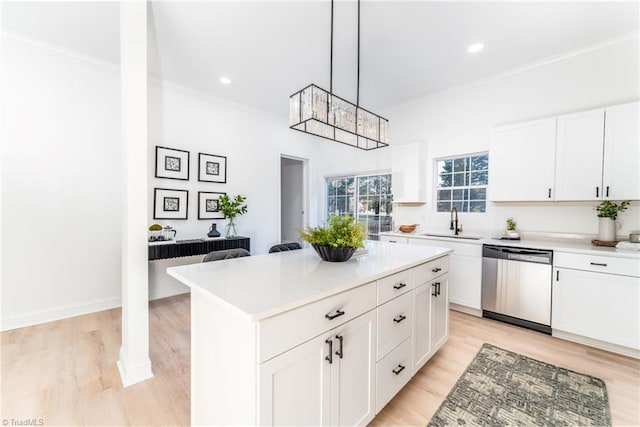 4114 Rose Lake Dr, Greensboro, NC 27407 - kitchen with white cabinets, dishwasher, a center island, and decorative light fixtures