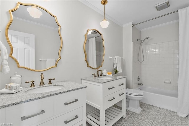 full bathroom featuring a sink, two vanities, ornamental molding, and shower / bath combo