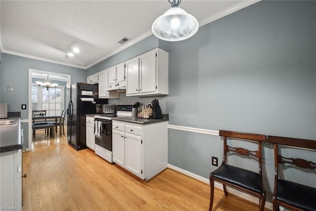 kitchen with white cabinetry, white range with electric cooktop, a chandelier, decorative light fixtures, and light hardwood / wood-style floors