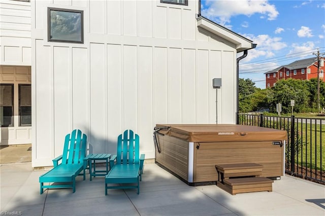 view of patio with a hot tub