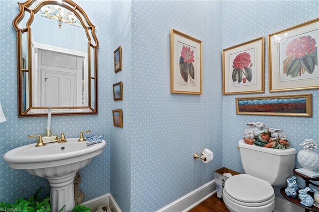 2792 Fieldwood Ct, Winston-Salem, NC 27106 - half bathroom with toilet and wood finished floors