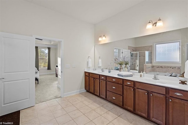 bathroom featuring separate shower and tub, tile patterned flooring, and vanity