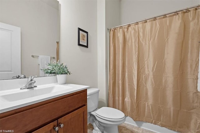 bathroom featuring walk in shower, tile patterned flooring, vanity, and toilet