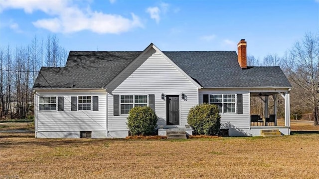 rear view of house featuring a lawn, a patio, and ceiling fan