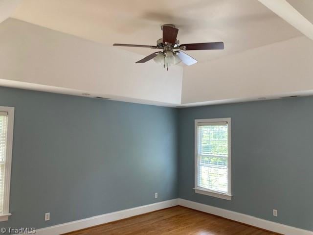 unfurnished room featuring ceiling fan and wood-type flooring