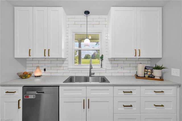 8194 Brotherstwo Rd, Colfax, NC 27235 - kitchen with stainless steel dishwasher, tasteful backsplash, and white cabinetry