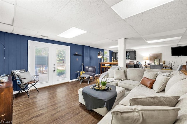 8194 Brotherstwo Rd, Colfax, NC 27235 - living area with a drop ceiling, wood finished floors, and french doors