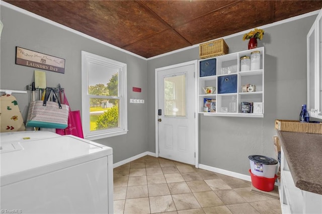 8194 Brotherstwo Rd, Colfax, NC 27235 - laundry area featuring ornamental molding, light tile patterned flooring, and washing machine and dryer