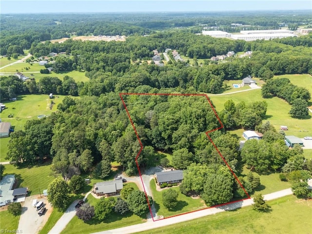 8194 Brotherstwo Rd, Colfax, NC 27235 - aerial view of property and surrounding area with a forest and property boundaries highlighted
