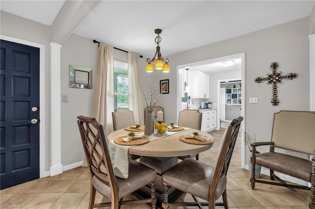 8194 Brotherstwo Rd, Colfax, NC 27235 - dining area featuring light tile patterned floors and baseboards