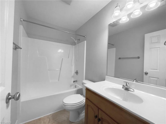 full bath with bathtub / shower combination, vanity, and toilet