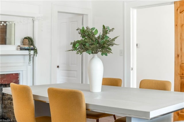 dining room with a fireplace