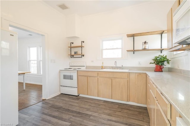 kitchen with white appliances, sink, dark wood-type flooring, and light brown cabinets