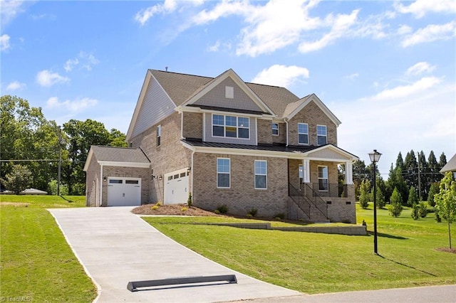 craftsman-style home featuring a front lawn and a garage