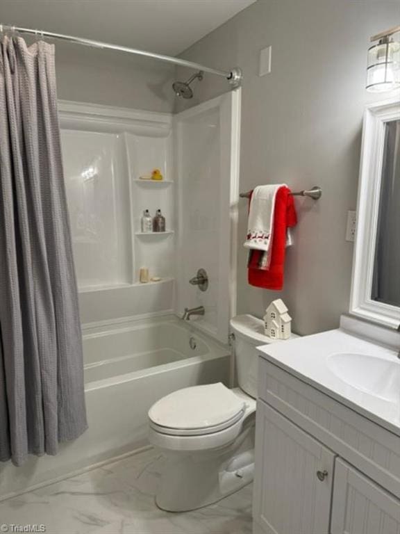 full bathroom featuring vanity, toilet, and shower / tub combo with curtain