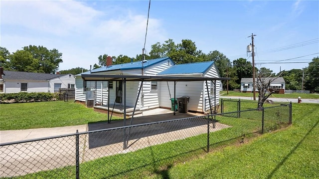 626 State Ave, High Point, NC 27262 - view of front facade with a fenced backyard, a patio, and driveway
