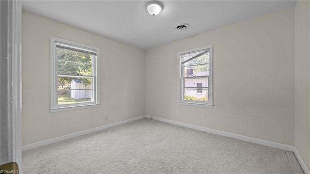 626 State Ave, High Point, NC 27262 - spare room featuring light colored carpet and baseboards