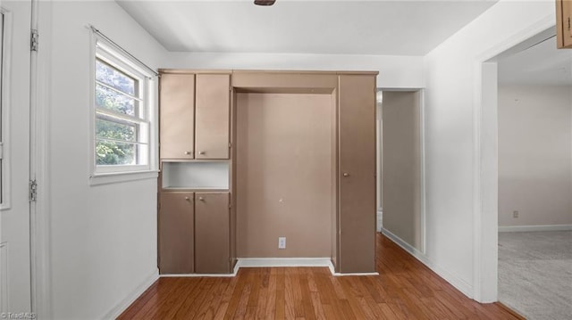 626 State Ave, High Point, NC 27262 - unfurnished bedroom with wood finished floors