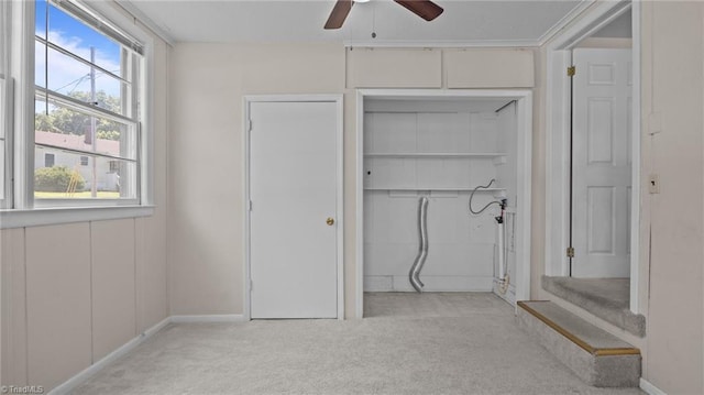 626 State Ave, High Point, NC 27262 - unfurnished bedroom featuring light carpet, a closet, and a ceiling fan