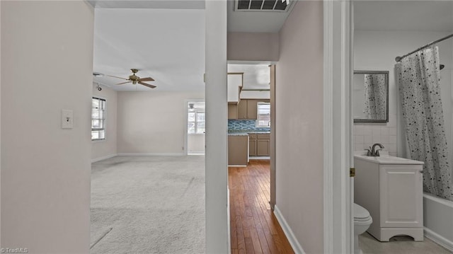 626 State Ave, High Point, NC 27262 - hallway featuring baseboards and hardwood / wood-style flooring